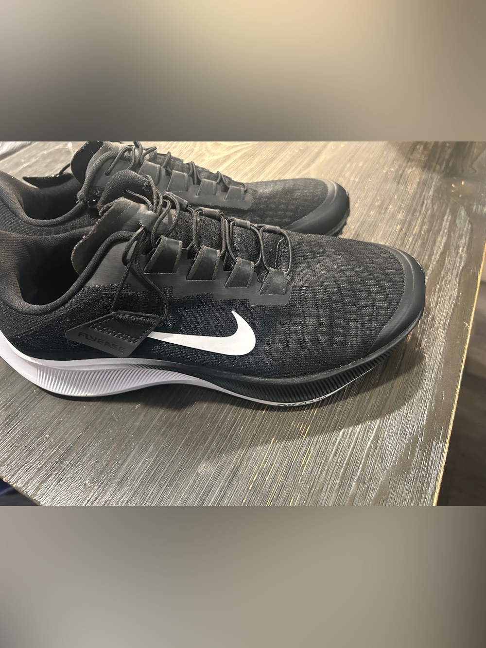 Nike Women’s Black Athletic Shoes with White Swoosh